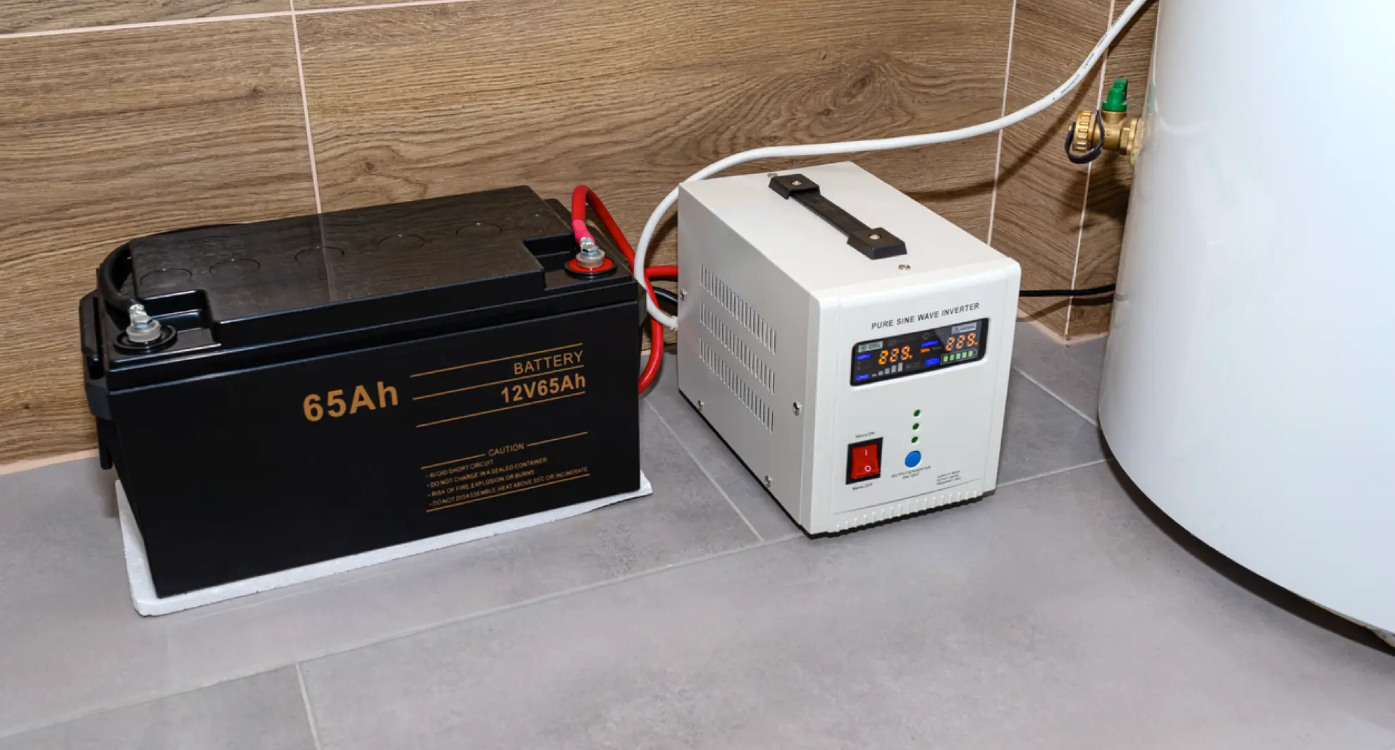 Home battery backup system with inverter on floor