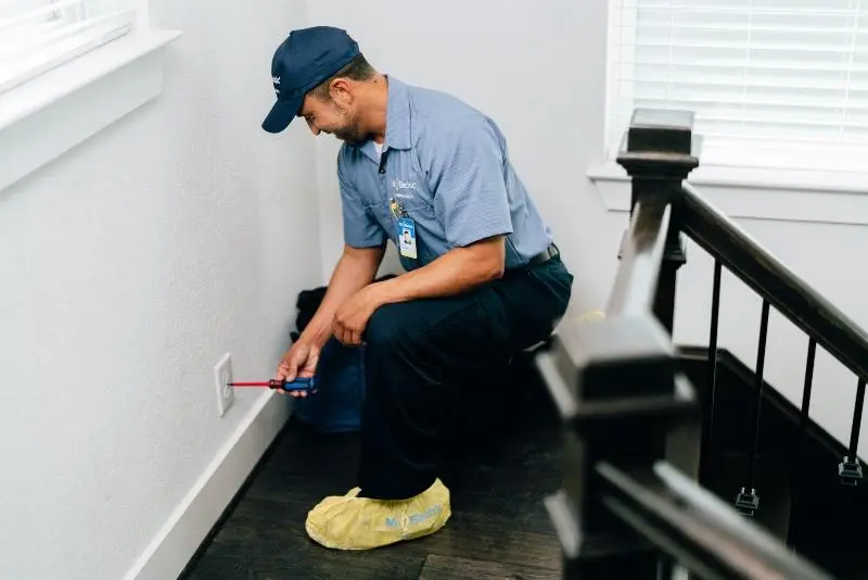 Mr. Electric of Citrus & Marion County, FL electrician installing a power outlet. 