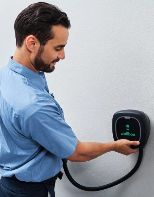 Mr. Electric technician installing a Wallbox.