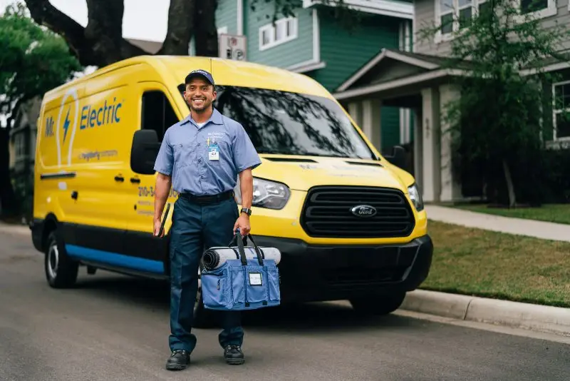 Mr. Electric electrician in Oak Ridge, TN standing in front of customer's home.